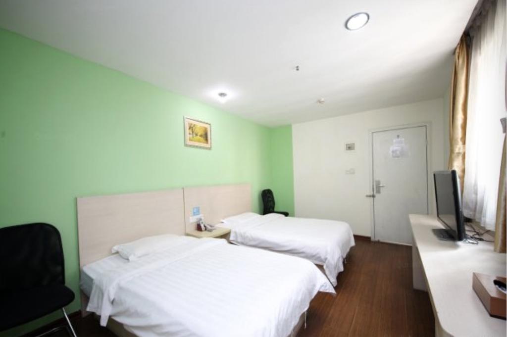 Yixin Business Hotel Cantão Exterior foto