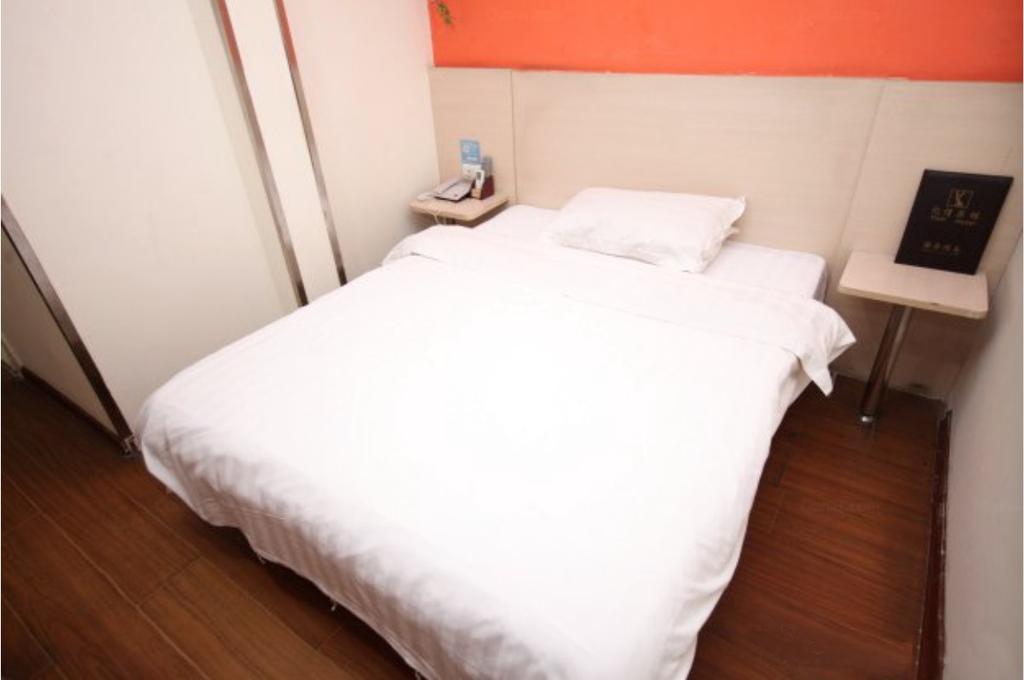 Yixin Business Hotel Cantão Exterior foto