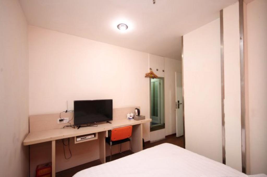 Yixin Business Hotel Cantão Exterior foto