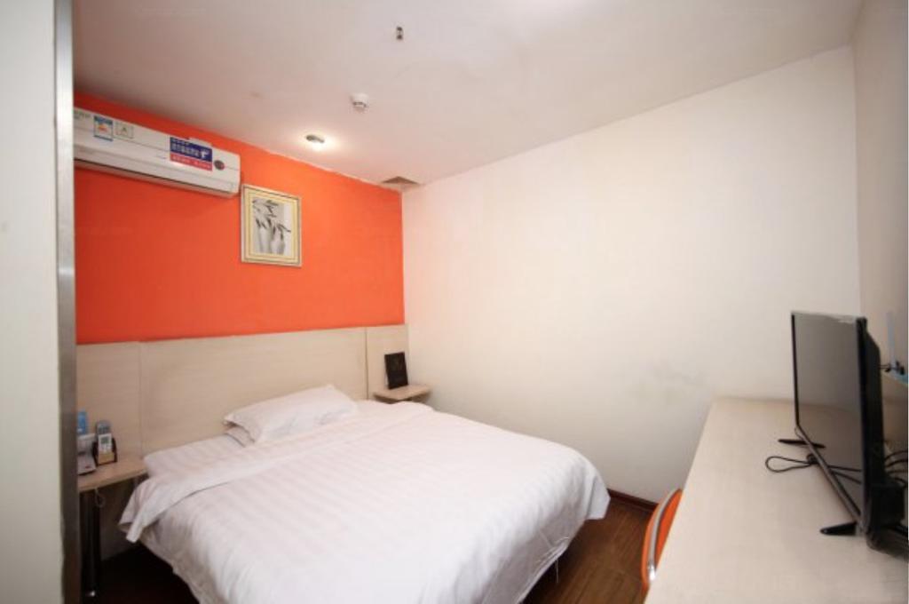 Yixin Business Hotel Cantão Exterior foto