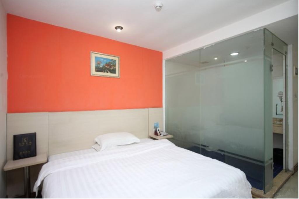 Yixin Business Hotel Cantão Exterior foto