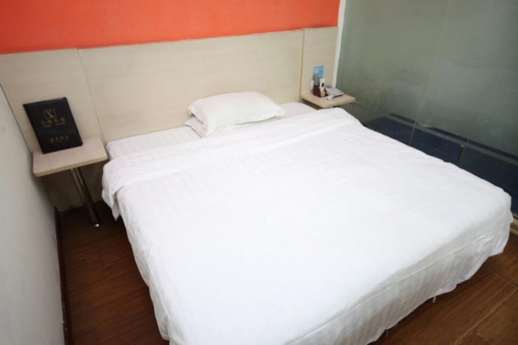 Yixin Business Hotel Cantão Exterior foto