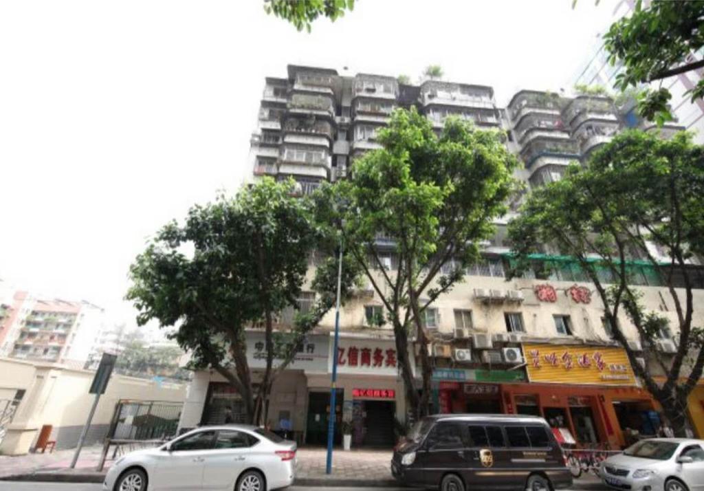 Yixin Business Hotel Cantão Exterior foto