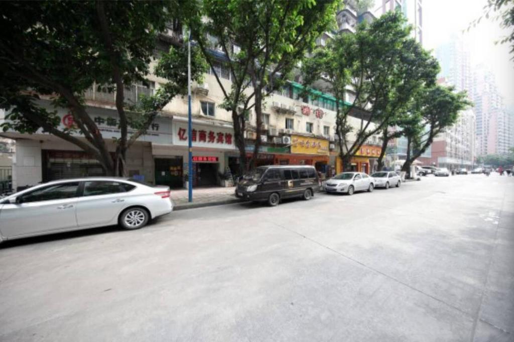 Yixin Business Hotel Cantão Exterior foto
