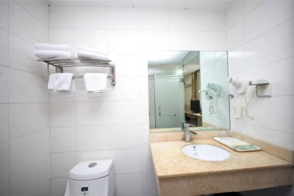 Yixin Business Hotel Cantão Exterior foto