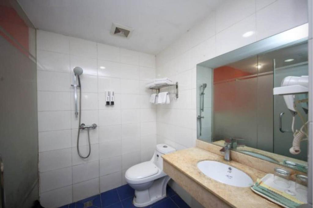 Yixin Business Hotel Cantão Exterior foto