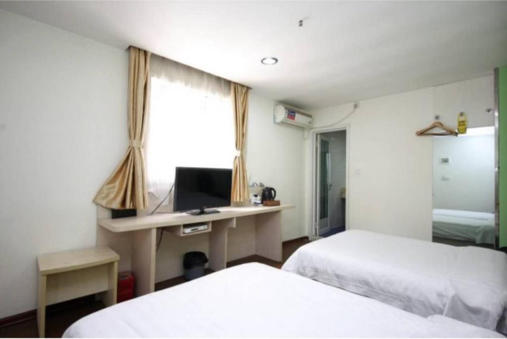 Yixin Business Hotel Cantão Exterior foto