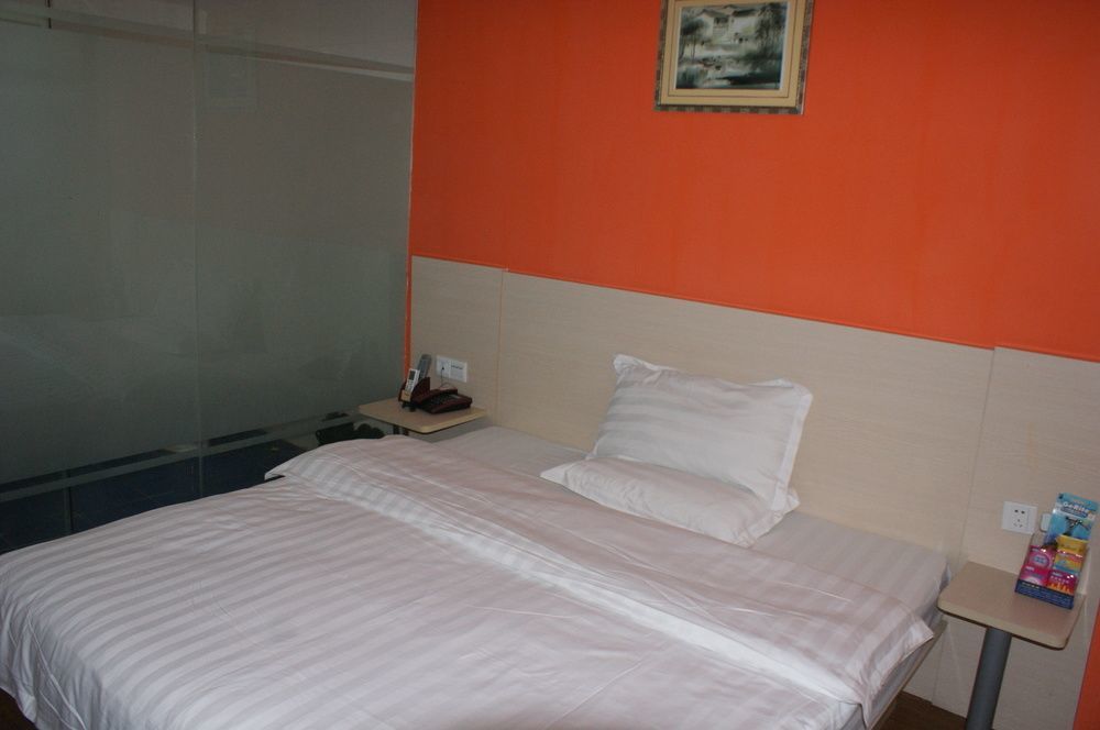 Yixin Business Hotel Cantão Exterior foto