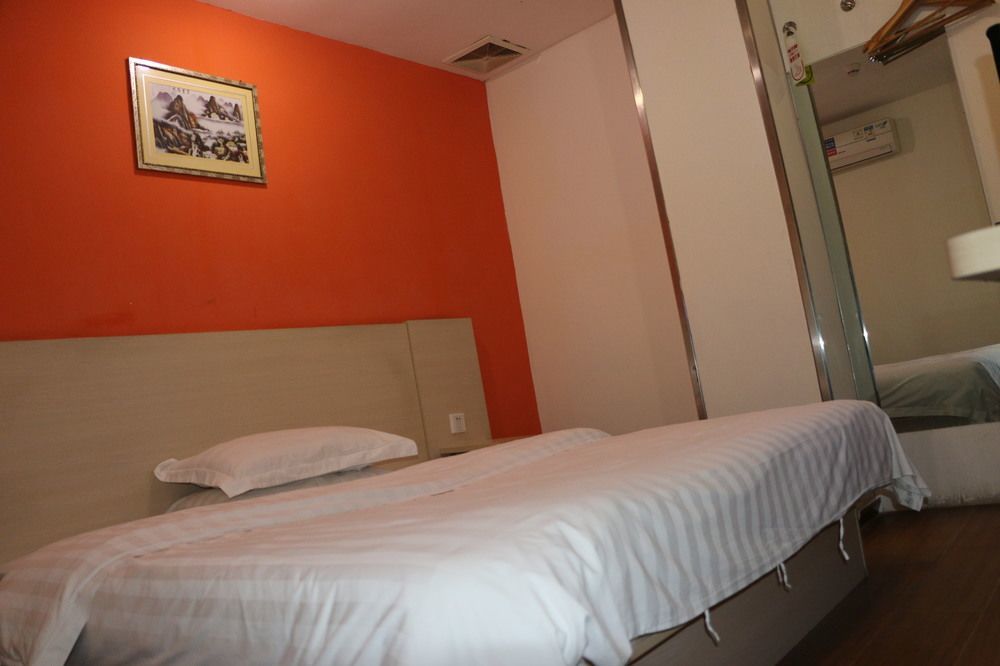 Yixin Business Hotel Cantão Exterior foto
