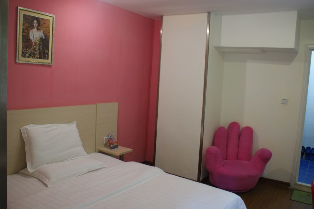 Yixin Business Hotel Cantão Exterior foto