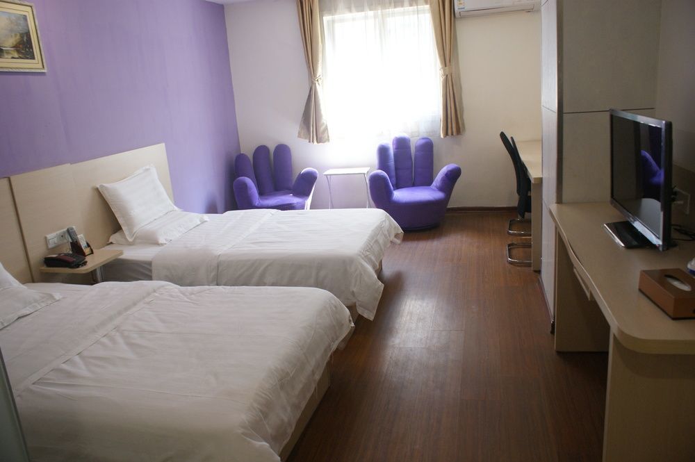 Yixin Business Hotel Cantão Exterior foto