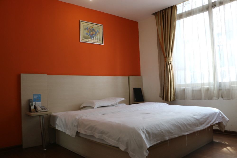 Yixin Business Hotel Cantão Exterior foto