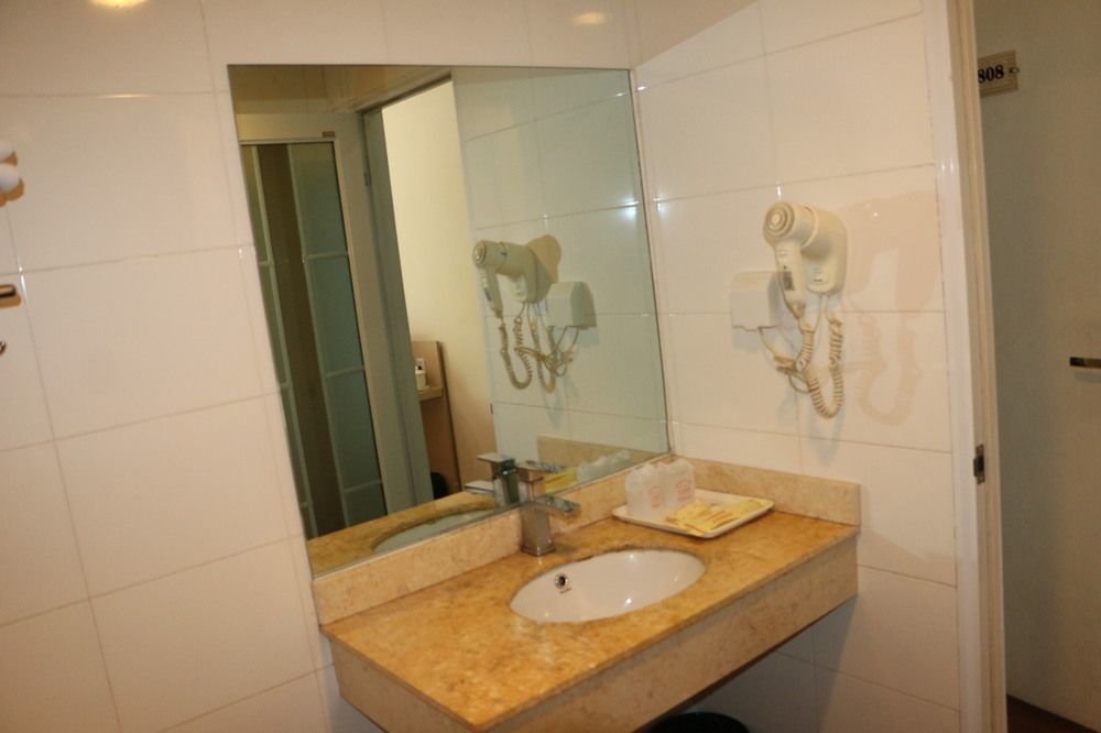 Yixin Business Hotel Cantão Exterior foto